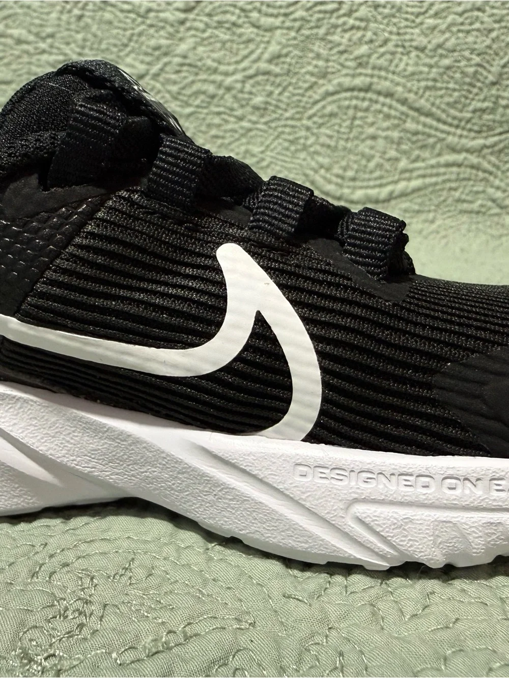 Nike Star Runner 4. Size 5c Black and white